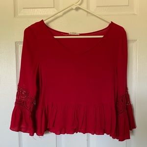 Red bell sleeve top